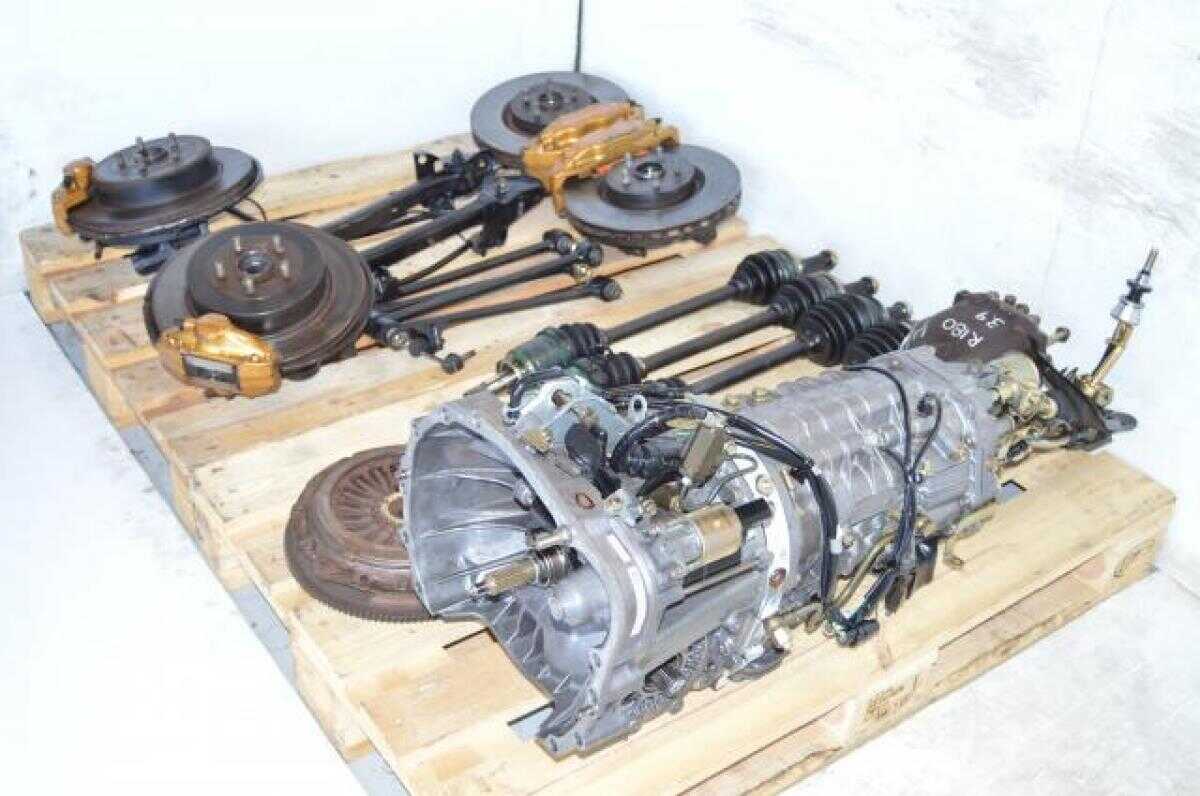 Used JDM Subaru STi TY856WB3KA 6 Speed DCCD Transmission Package with 4 Corner Axles, Brembo Calipers , 5x100 Hubs, Control Arms, etc